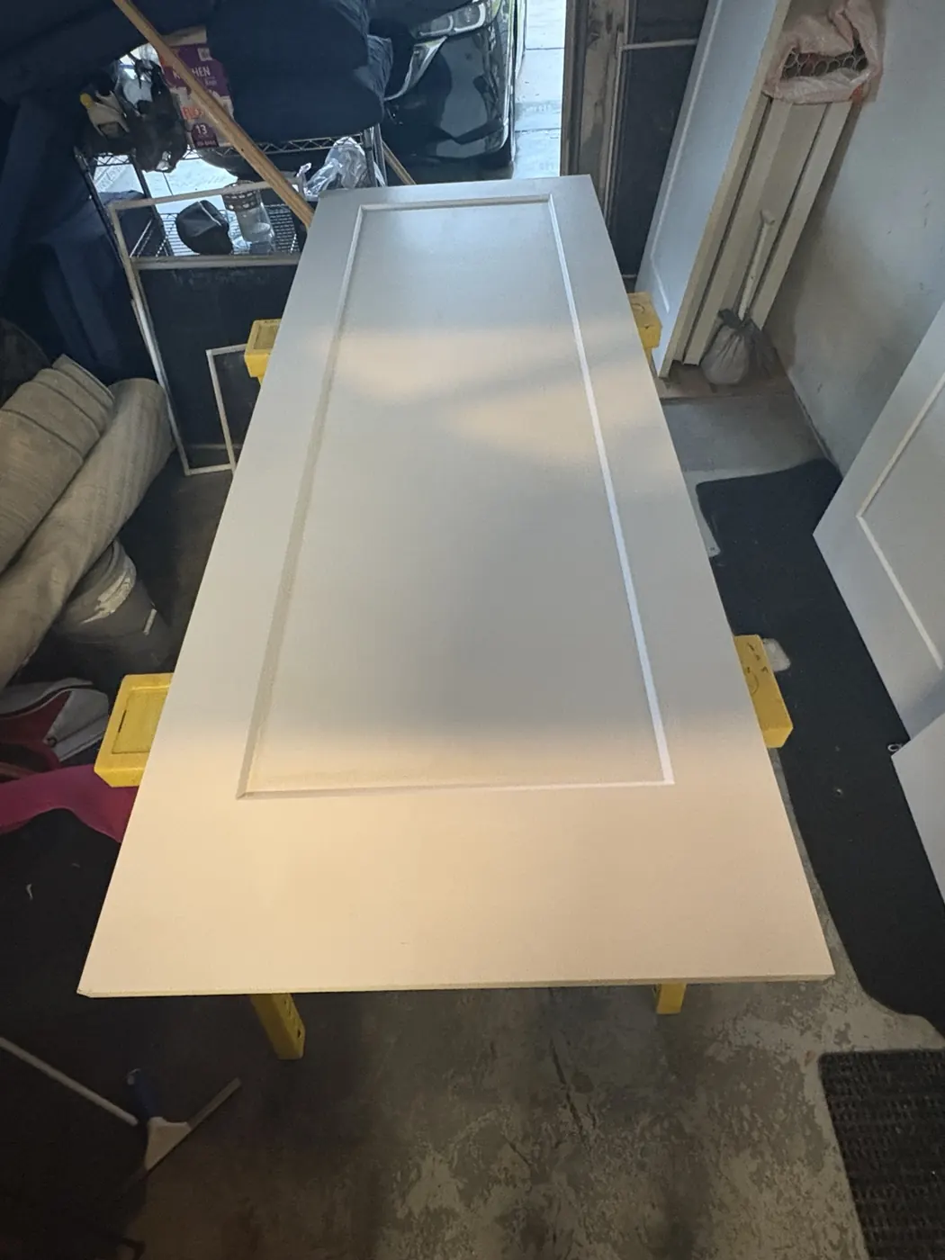 Shaker-style door panel during finishing work