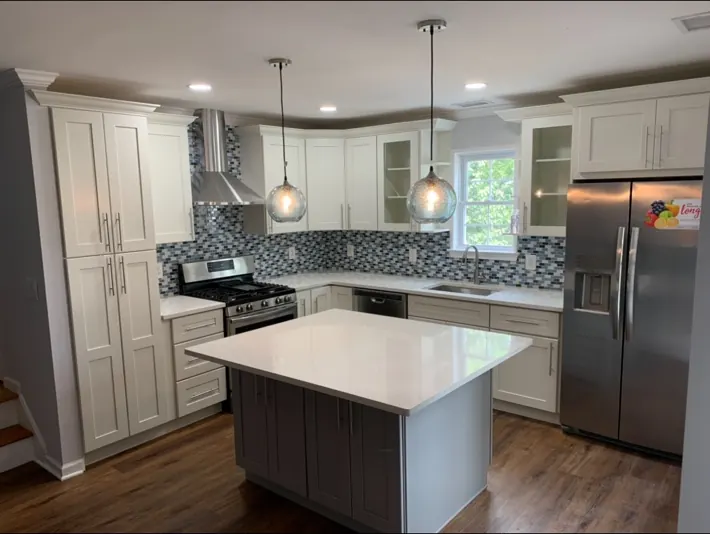 Completed kitchen remodel viewed across the island